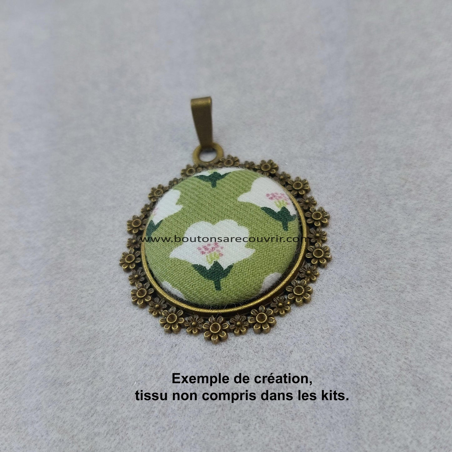 Bouton à recouvrir